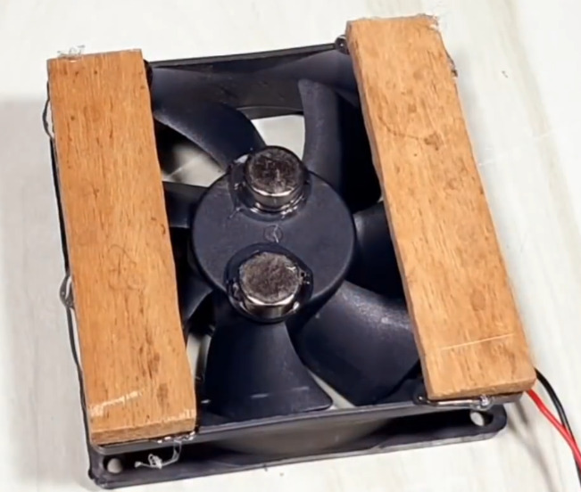 Attaching Wooden Pieces to Cooling Fan for Water Jar Support