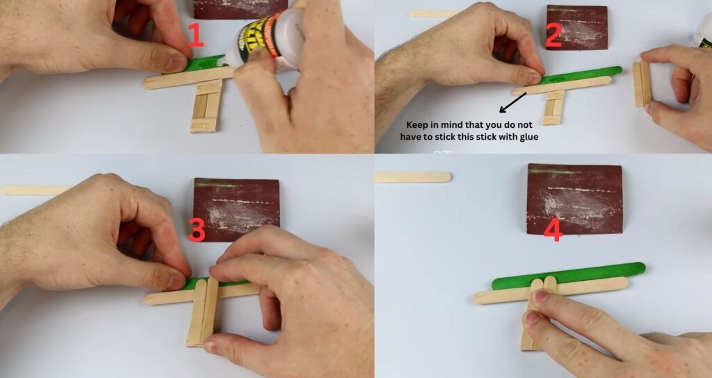 Glue the second piece of the two glued sticks over the first one 