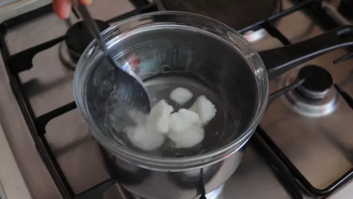 Melt coconut oil using double boiler.