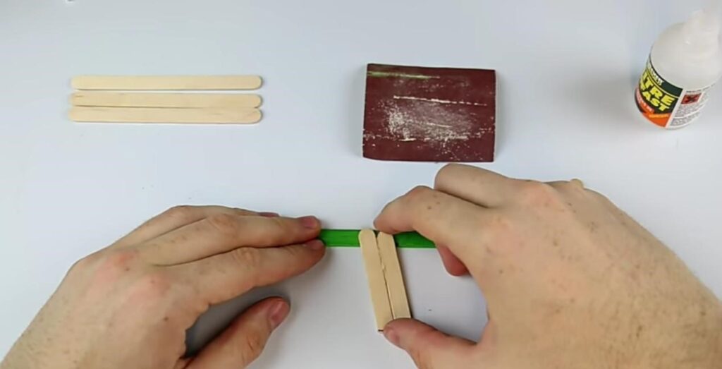 Pasting Glued Ice Cream Stick Piece at 3 cm Mark on Colored Stick