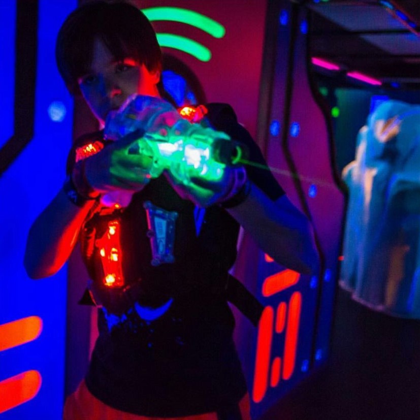 Players in laser tag games hiding their moment with dark clothes