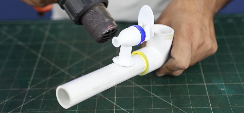Sealing RO Tap to PVC pipe using hot air gun.