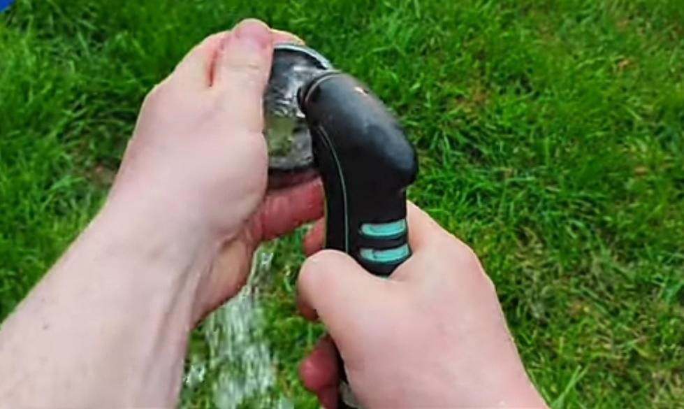 clean the head of the water spray gun with water